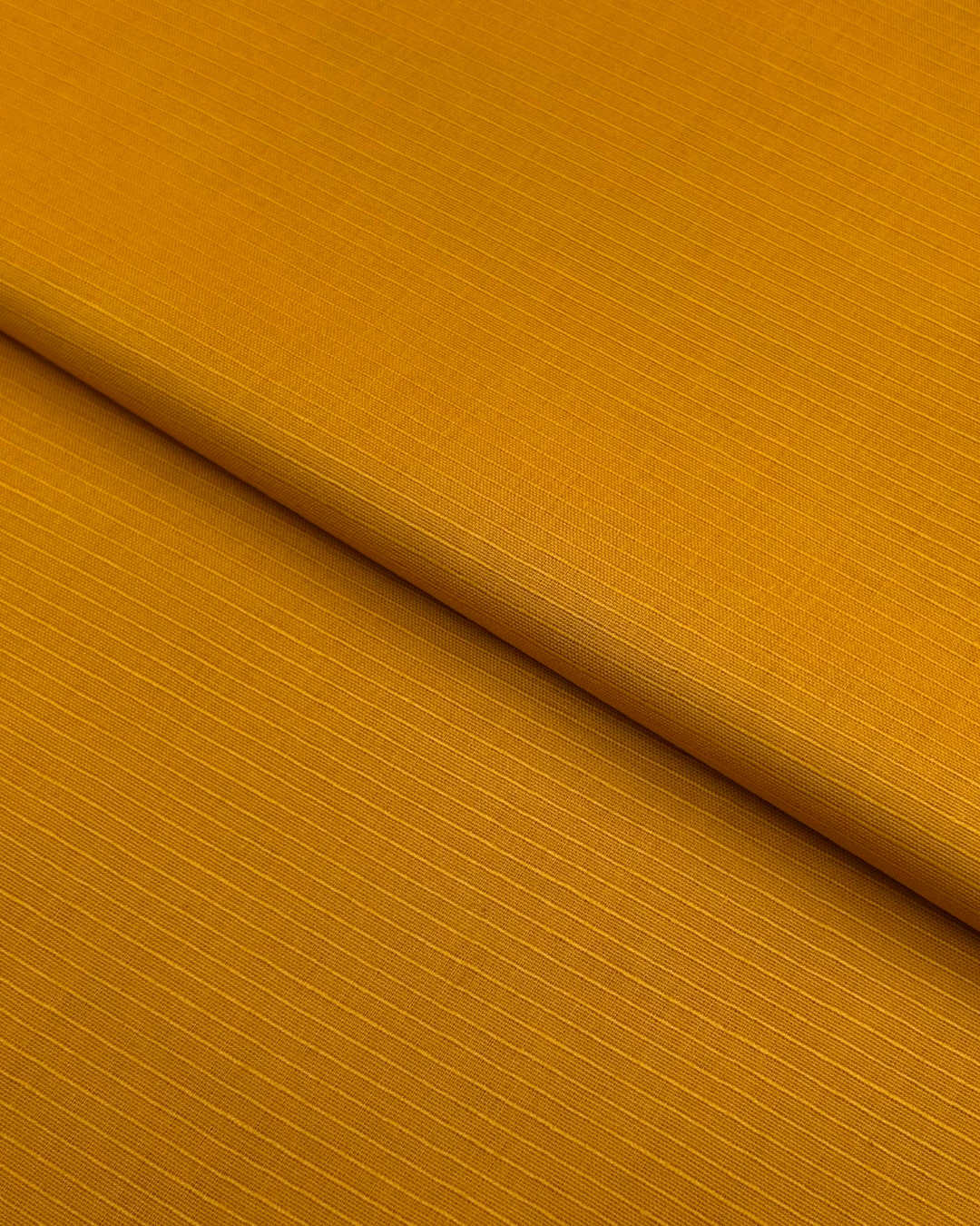 Rib Lawn – Mustard, self-textured lawn fabric by the meter