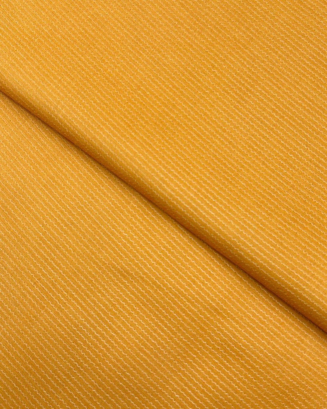 Maisuri Lawn – Mustard, self-textured lawn fabric by the meter
