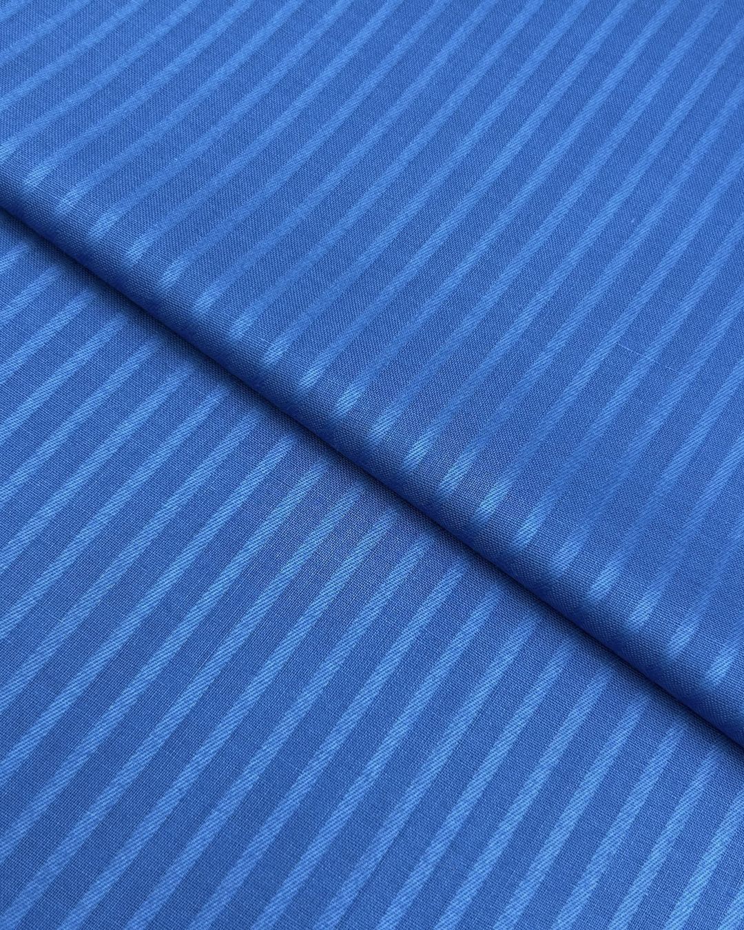 Doria Lawn – Ink Blue, self-textured lawn fabric by the meter