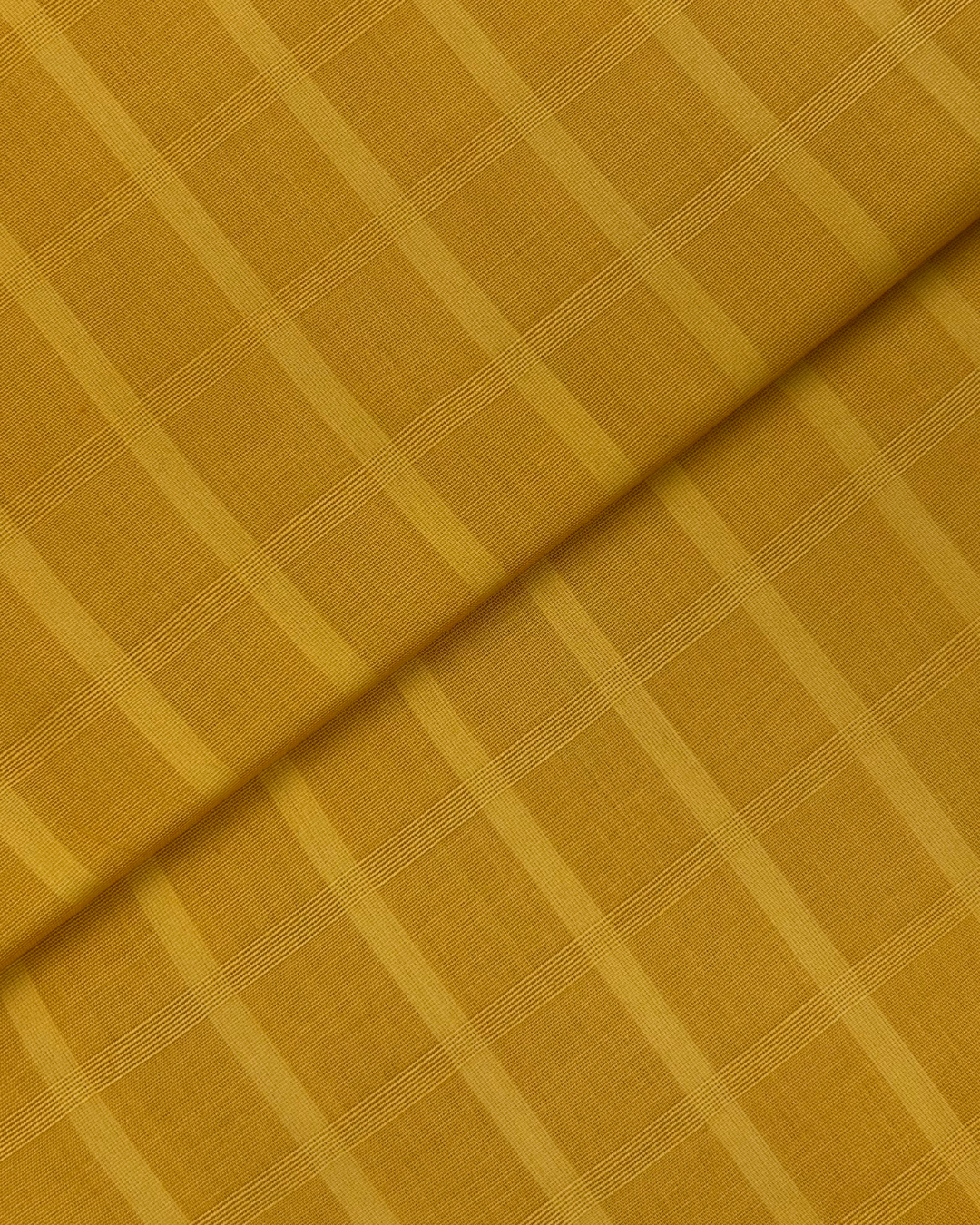 Doria Lawn – Mustard (ILS-S25-0006), self-textured lawn fabric by the meter