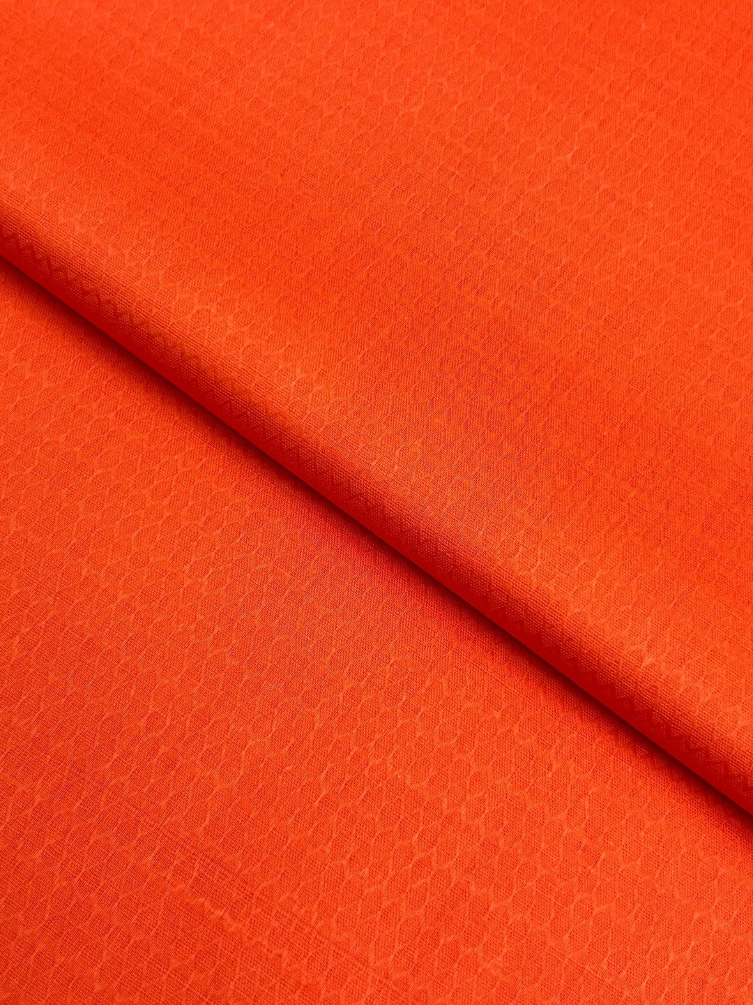Jacquard Lawn – Orange fabric