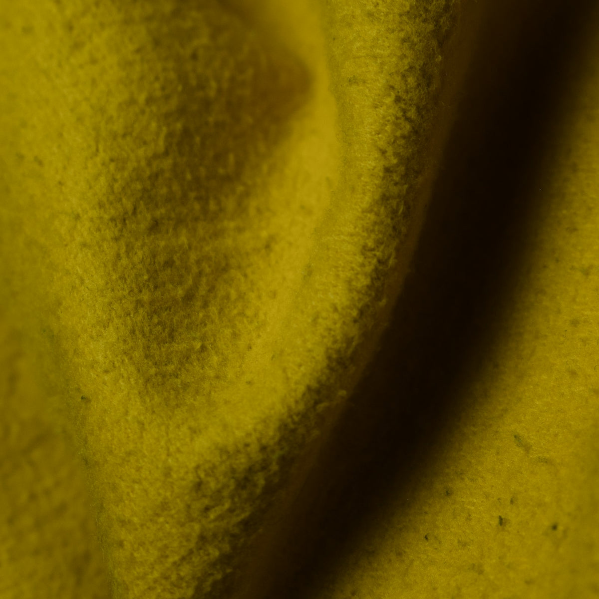 Mustard khaddar fabric – close-up